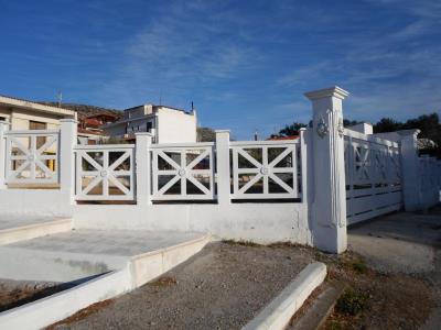 T6064  Περίφραξη  οικοπέδου  με  χιαστό  κάγκελο